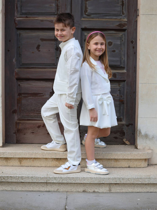 Manuel Ritz - Gilet bianco, camicia coreana, pantalone | Liu Jo - Completo giacca, gonna panna e t-shirt rosa